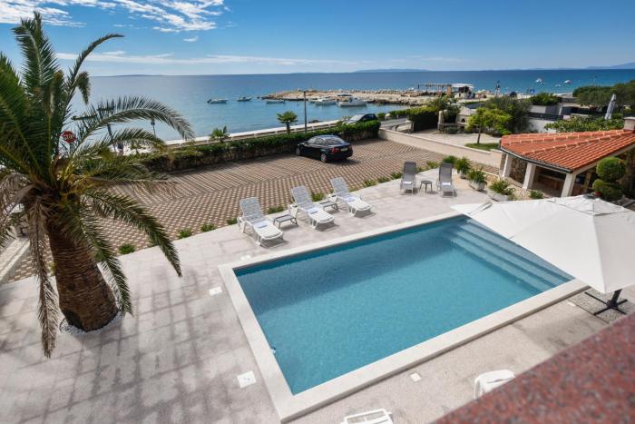 Beachfront Apartments Tolo with Pool