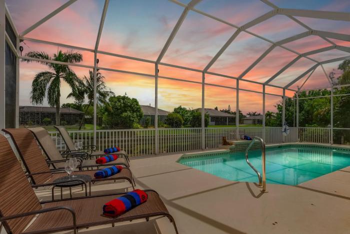 Waterfront Paradise with Heated Pool, Kayaks, & Game Room Villa Cape Paradise Roelens Vacations