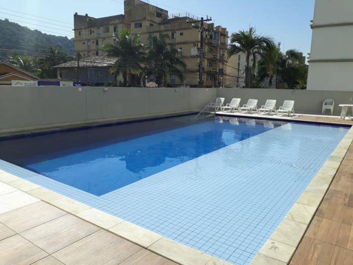 Apartamento 500m Praia da Enseada Guarujá varanda e vaga de garagem