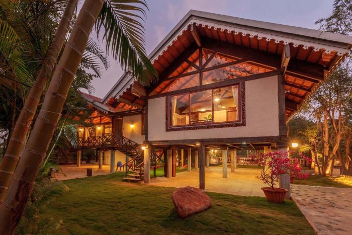 Aranyam Villa by StayVista with Modern wooden interiors, Kidszone, Indoor games & plunge pool