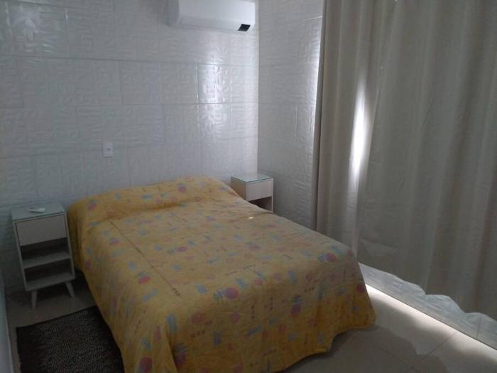 Casa agradável em Camboriú com estacionamento no pátio