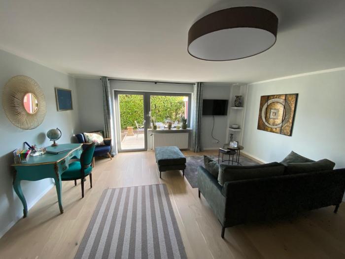 Schöne Wohnung mit Ausblick und Gartensitzplatz