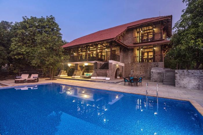 SaffronStays Vedika - 4BR riverfront pool villa with kaya king bullock ride & BBQ near Pinjal River, Vikramgad