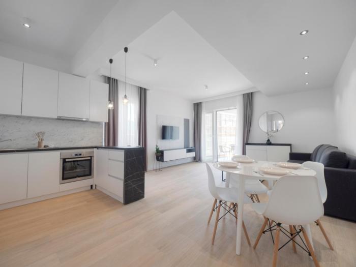 Modern Two Bedroom Apartment with Partial Sea View, Pool and Parking