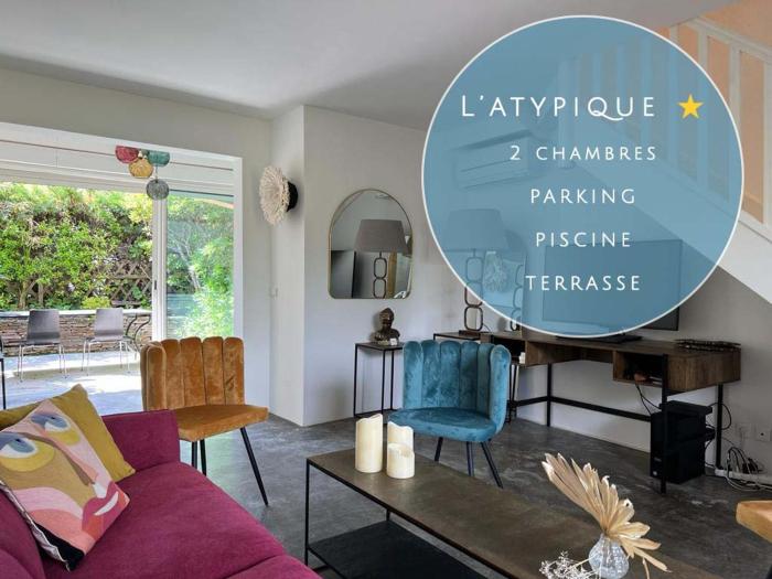 L’atypique : 2 chambres Piscine parking