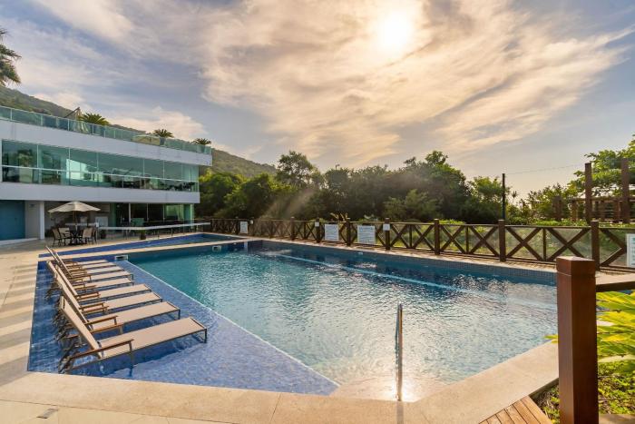 Varandas do Atlântico - Confortável Apartamento em Condo Pé na Areia