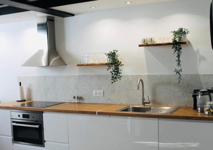 Duplex atypique rénové en plein centre du village