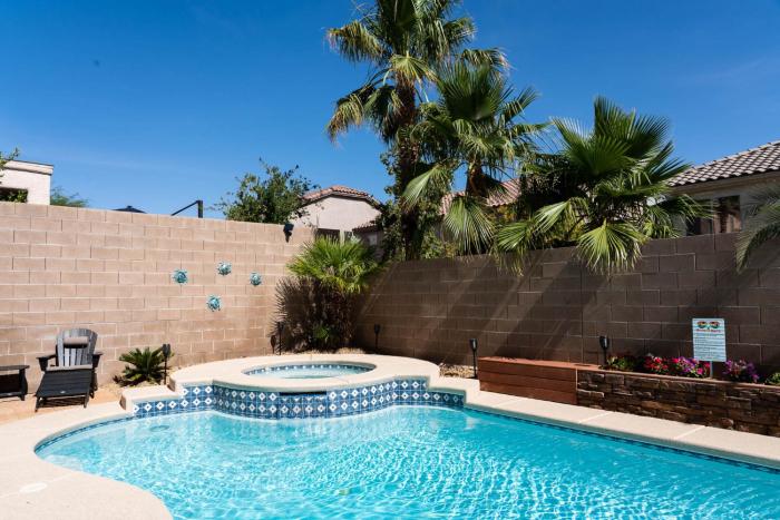 OFF THE STRIP 5Bed 3bath with private salt pool and hot tub and EV station
