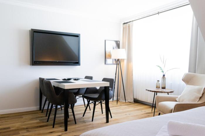 Strandnahe Ferienwohnung - sehr modern und hochwertig eingerichtet, inklusive Parkplatz, Gartenzugang und Fahrradunterstellmöglichkeit