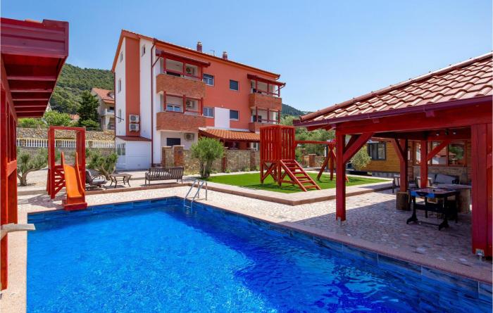 Awesome Apartment In Banjol With 2 Bedrooms, Wifi And Outdoor Swimming Pool