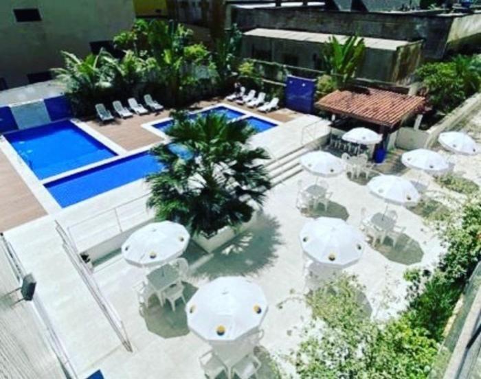 Cap2, flat com churrasqueira , 2 dormitórios, piscina, muito próximo a praia