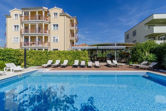 Family friendly apartments with a swimming pool Trogir - 16509