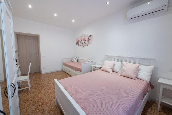 Casa Rosa Beige e Blu