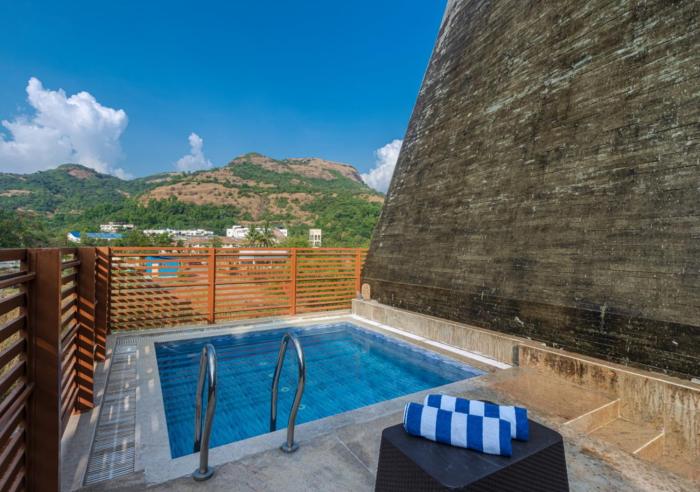 SaffronStays Urja, Lonavala - Private villa with 2 pools, spa room, private elevator & waterfall