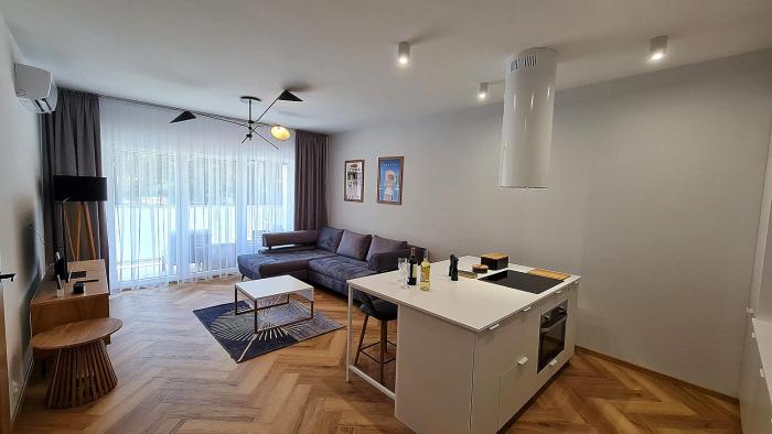 Press Apartament salon z aneksem kuchennym sypialnia łazienka taras