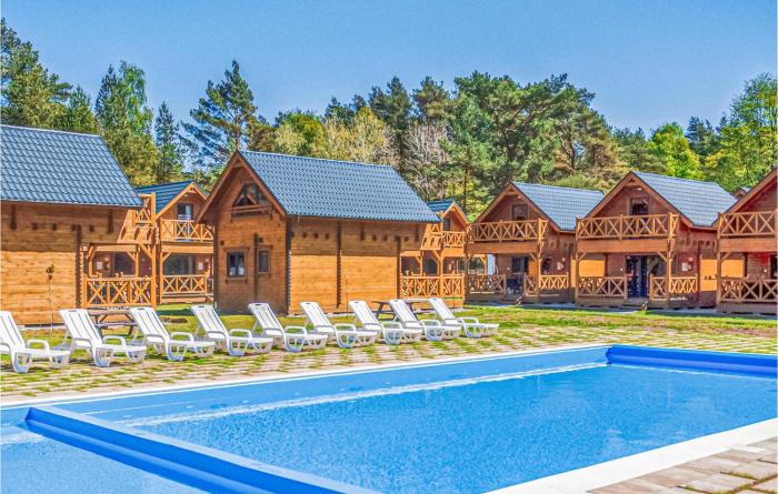 Amazing home in Mrzezyno with 2 Bedrooms WiFi and Outdoor swimming pool