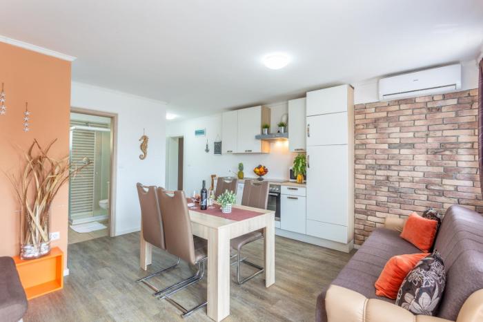 Apartment in Njivice with sea view, balcony, air conditioning, WiFi (4930-1)