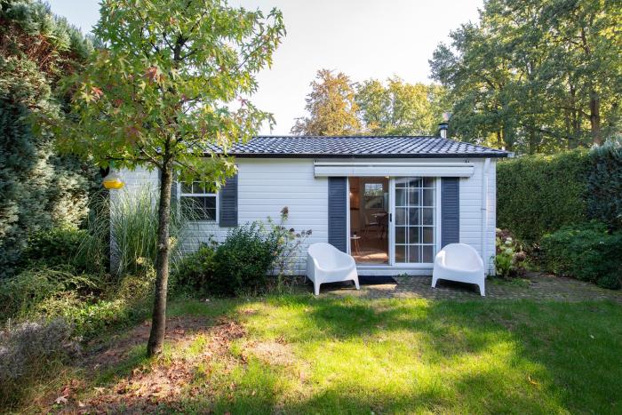 84, gelegen in het rustige & bosrijke Oisterwijk! Met privétuin