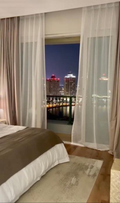 Beachfront Luxury Apartment-Pearl Island شقه مطله على الشاطئ بجزيرة اللؤلؤه