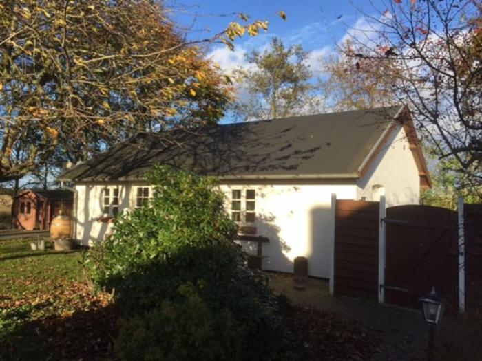 Idyllisk anneks, hvor lejer har eget hus.