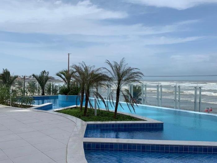 Apartamento pé na areia