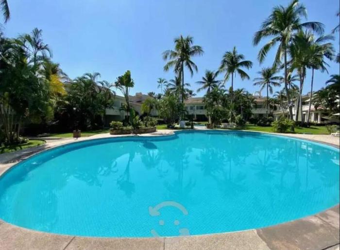 Hermoso apartamento en Manzanillo con alberca y cancha de tenis, Ideal para relajarse y disfrutar de una escapada tranquila en el paraíso tropical
