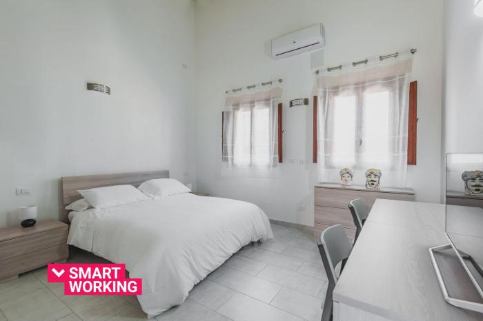 Modern duplex with balcony by Wonderful Italy