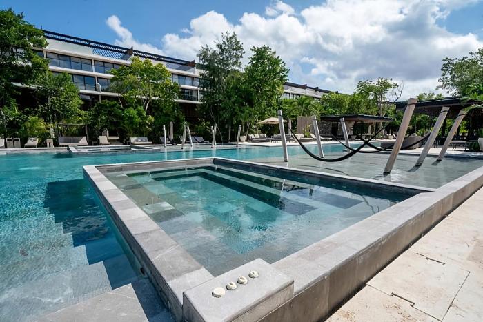 New & Exclusive Apartment in Quiet Playacar Pool Gym