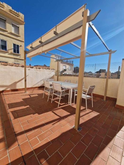 Ático moderno con terraza privada en Málaga centro