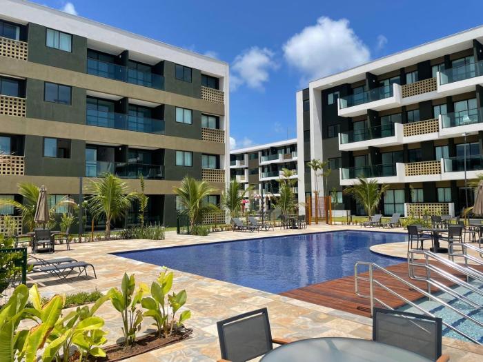 Flat ESTUDIO de LUXO - Praia de Muro Alto - Piscinas - Ideal para CASAIS, famílias com crianças - ap COMPLETO - AR COND, WI FI, NETFLIX, ESTACIONAMENTO - 400 mt do MAR