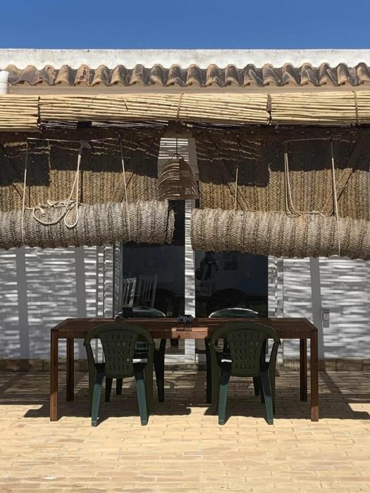 Las Casitas de la Barrosa con jardín y piscina