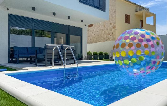 Amazing apartment in Jezera with WiFi Swimming pool and 2 Bedrooms