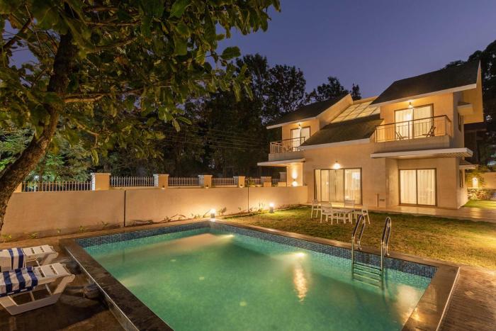 StayVistas Enchanting Haven - Modern Interiors, Sprawling Lawn with Gazebo, Swimming Pool, Indoor Games