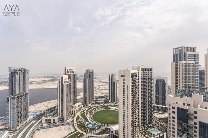 Elegant Luxury Apartment with Stunning Lake Views in Dubai Creek Harbour By ĀYA Boutique