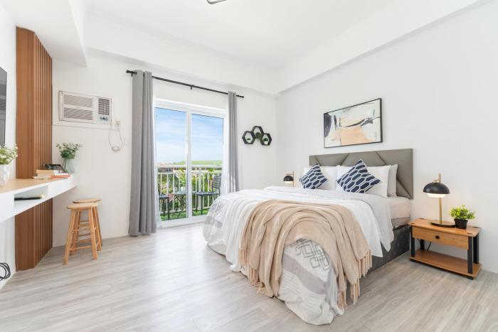 Amani Grand #332, Near Mactan Airport,Fast WIFI, Netflix & Pool