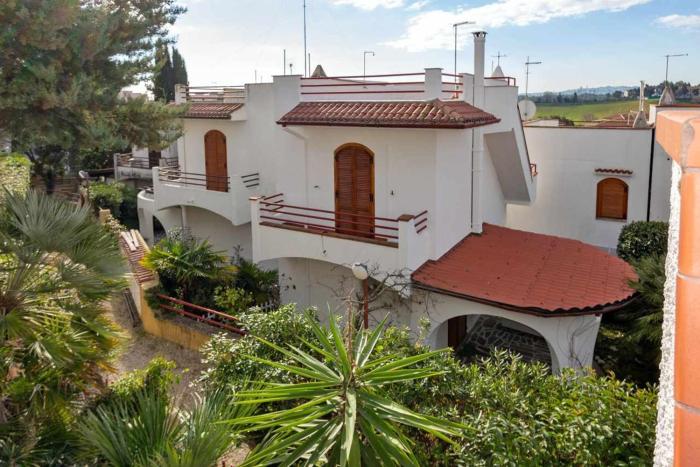 R26 - Graziosa villetta al villaggio Le Plejadi