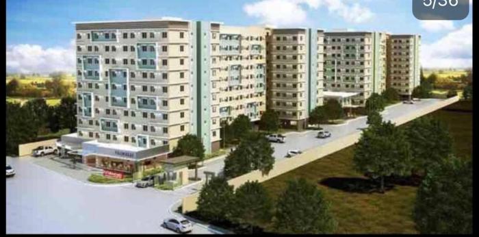 One spatial iloilo city two bedroom condo with free Netflix wifi pool and Gym