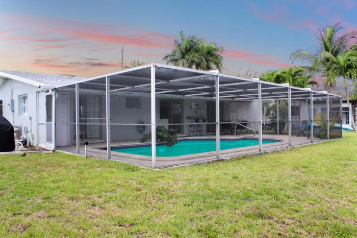 Modern Waterfront Home on Canal with Pool