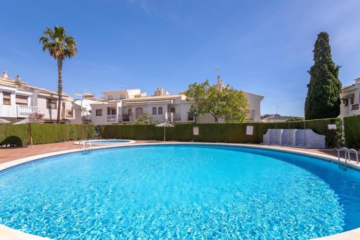 Casa en la playa con piscinas 11 A