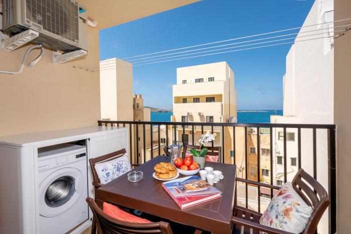 Sea Bliss Apartments with terrace just off seafront in St Pauls Bay - By Getawaysmalta