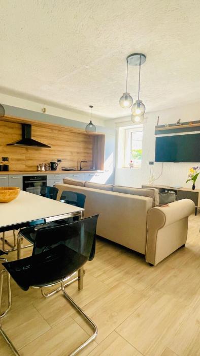 Modern Apartment with Fireplace & Stylish Kitchen