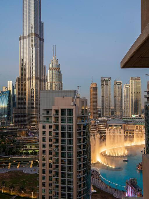 2BR Burj View with Balcony, Pool, Gym & Walk to Dubai Mall