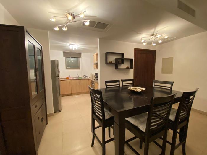 Lovely first floor tow bed rooms overviewing circular pool for families only in Talabay Aqaba