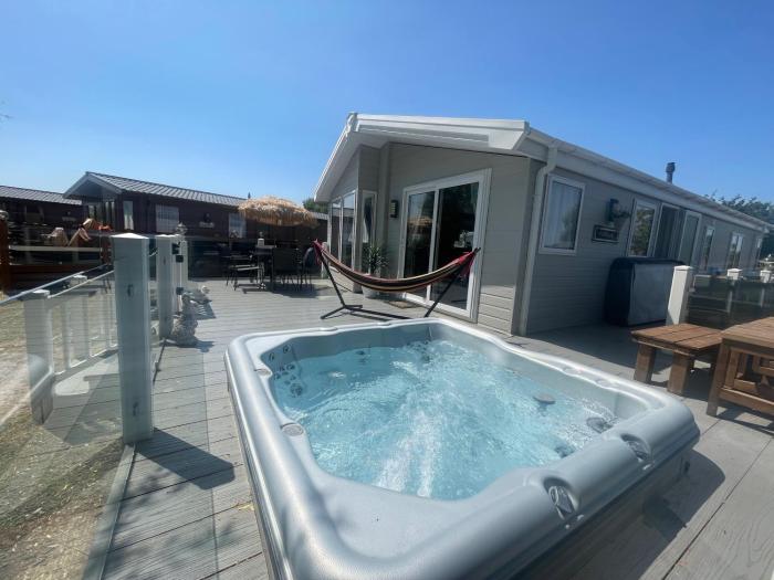 Indulgence lakeside lodge i1 with hot tub, private fishing peg situated at Tattershall Lakes Country Park