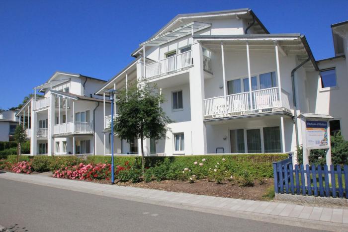 Terrasse, gratis Nutzung vom AHOI Erlebnisbad und Sauna inSellin - Villa Karola FeWo 06