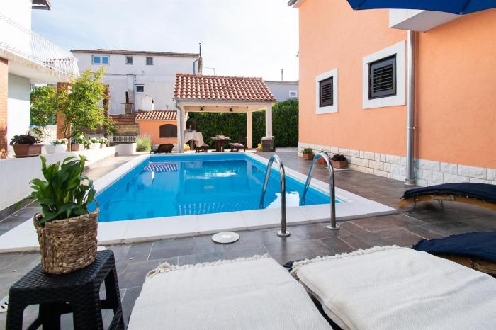 Apartments and Room Agiss with pool