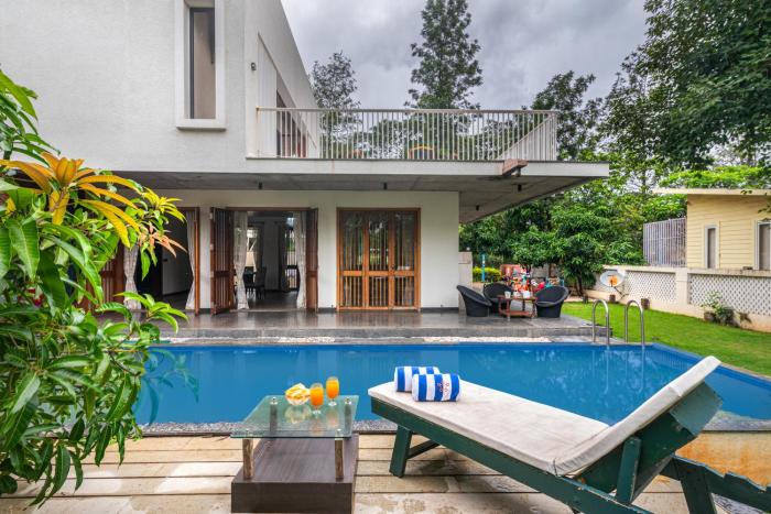 SaffronStays Amrapali - 5BHK Villa in Nashik with Pool, Lawn & Kids Play Area