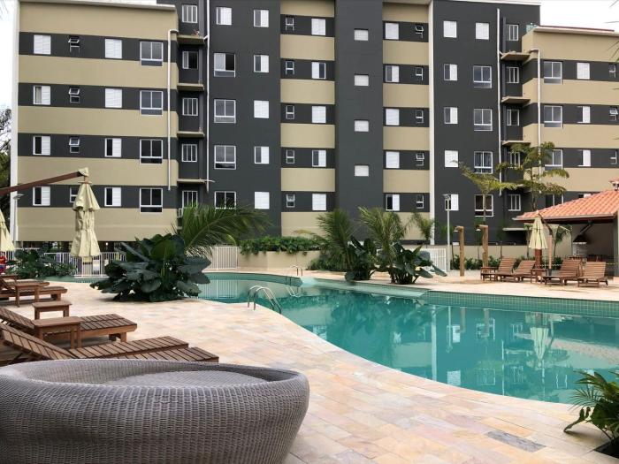 Apartamento com piscina aquecida e churrasqueira