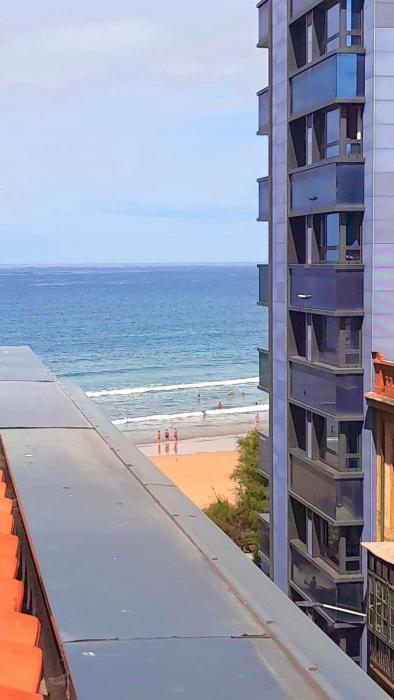 Ático con terraza en playa de San Lorenzo