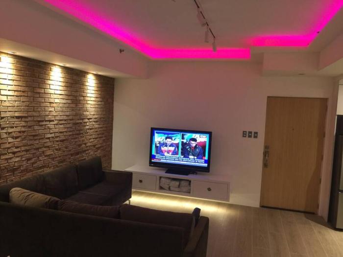 Cozy60sqm 1BR balconyprkingWifiNtflix near Mall